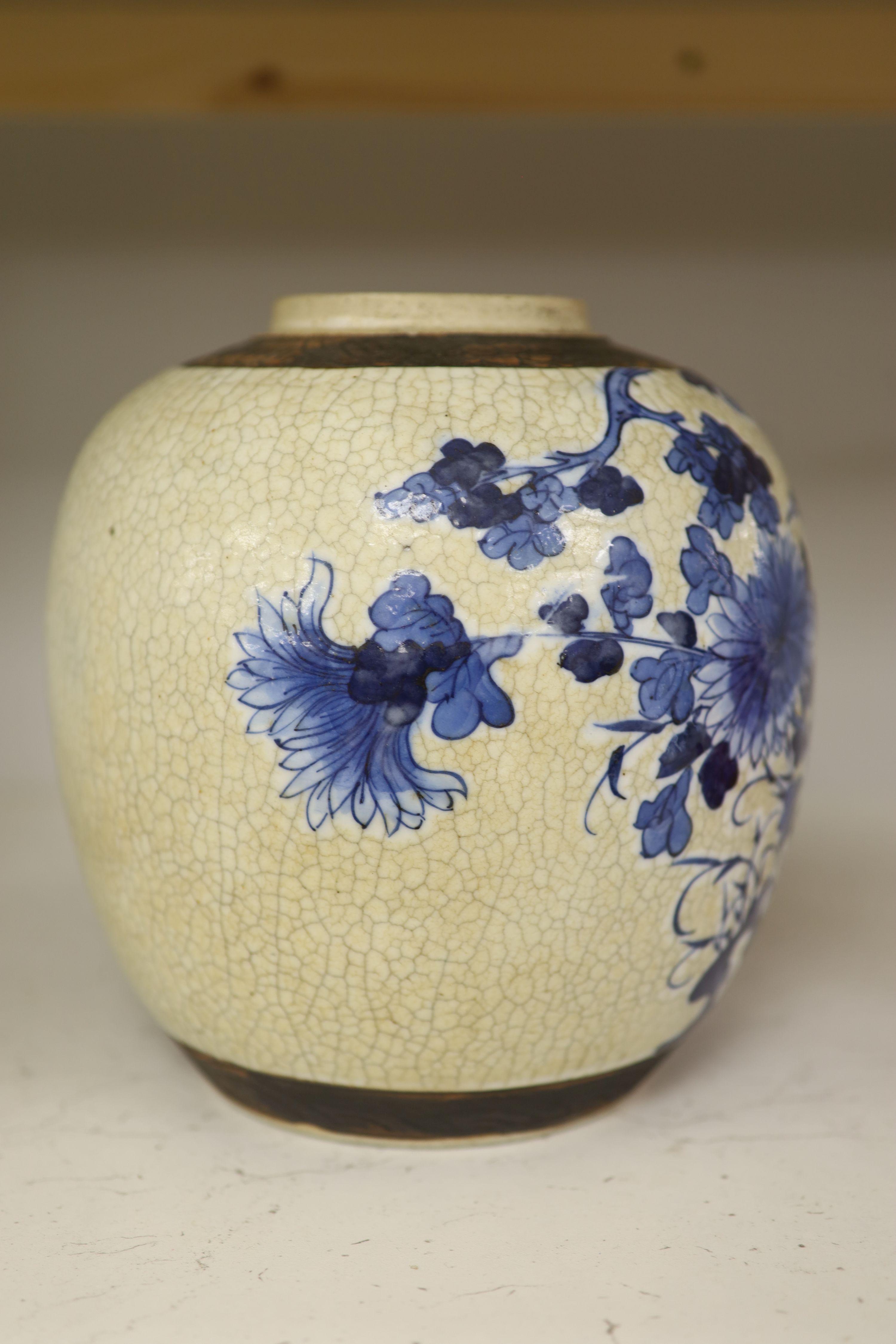 A 19th century/early 20th century Chinese blue and white crackle glaze jar, height 22cm